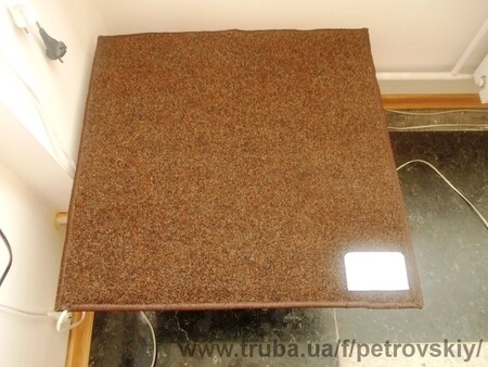 Килимок з підігрівом