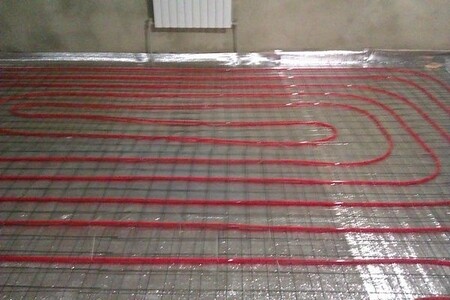 Монтаж теплых полов в котедже