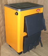 Котел твердотопливный `Огонек` с плитой (Старобельск). Доставка по Украине перевозчиками, оплата после получения товара. Цена завода-производителя. &mdash; Старобельский машиностроительный завод